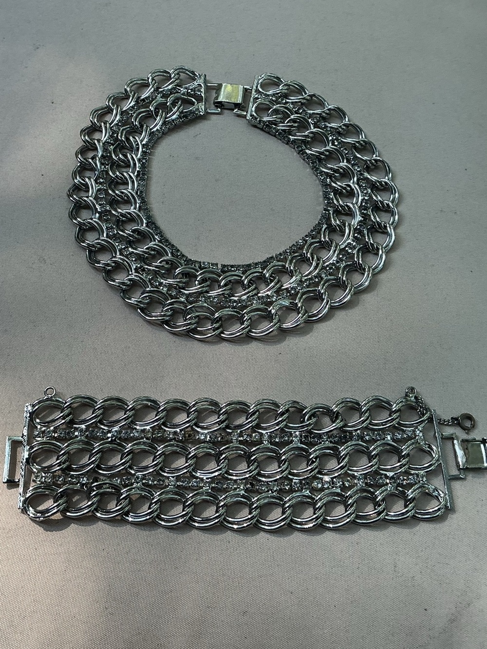 Silver-tone Multi-Row Chain Choker Necklace and Bracelet Set.